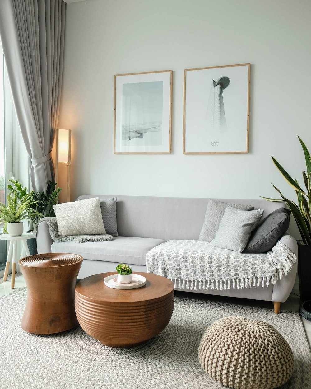 A soft neutral living room photographed from the corner