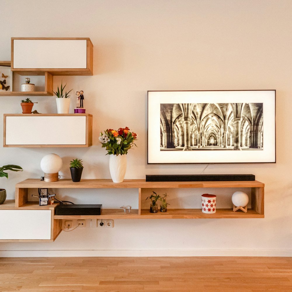 Timber shelving with ceramics and plants